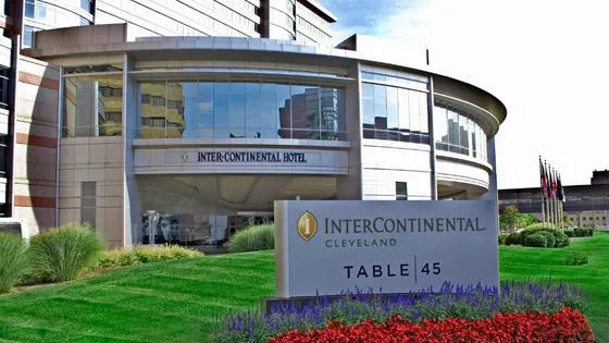 Lawn sign for InterContinental Cleveland in front of glass