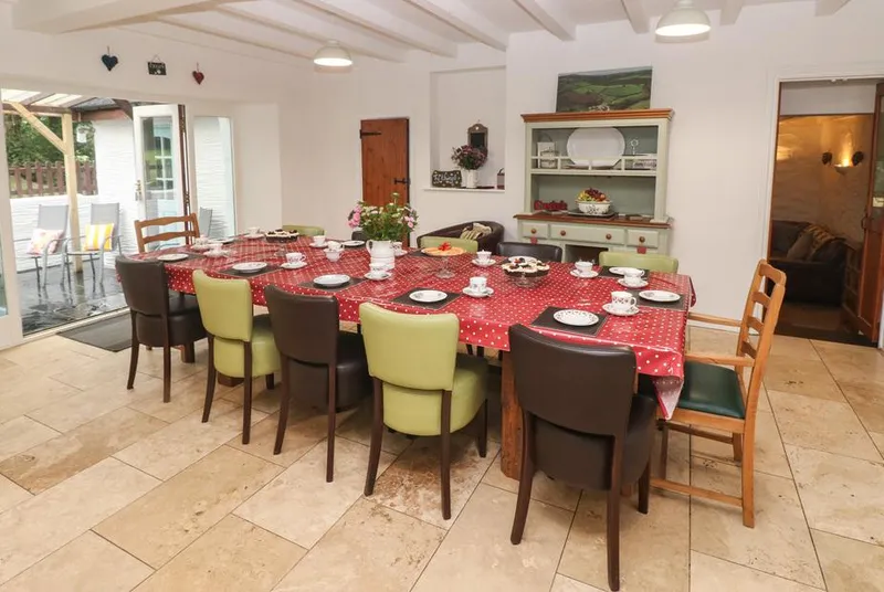 Ty Llwyd long dining table laid for a large family meal