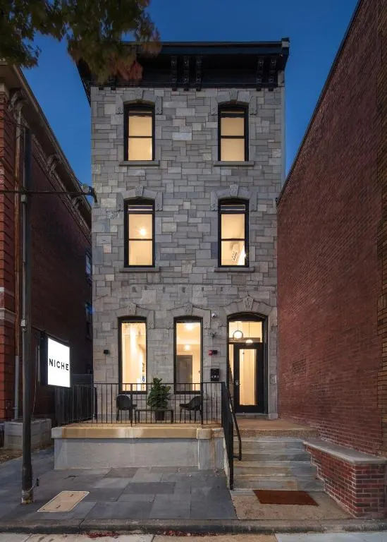 Brick building with windows on a street