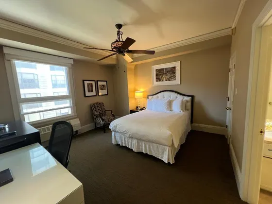Bedroom with a bed and a ceiling fan
