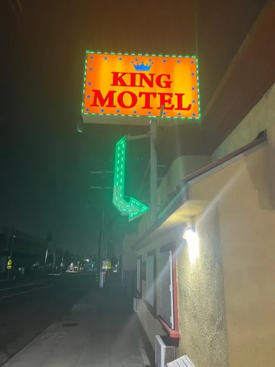 King Motel sign on the side of a building