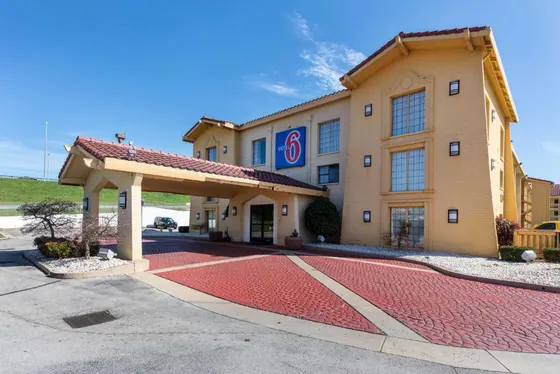Hotel with a red carpet in front of a building