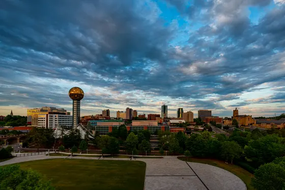 Knoxville skyline and the Sunsphere beneath dramatic clouds