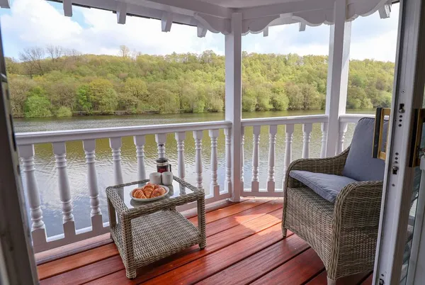 Lady Of The Lake covered veranda over the lake with wine and seating