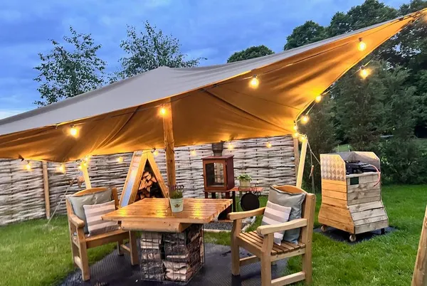 Limetree Luxury Glamping Portland canopy dining at dusk