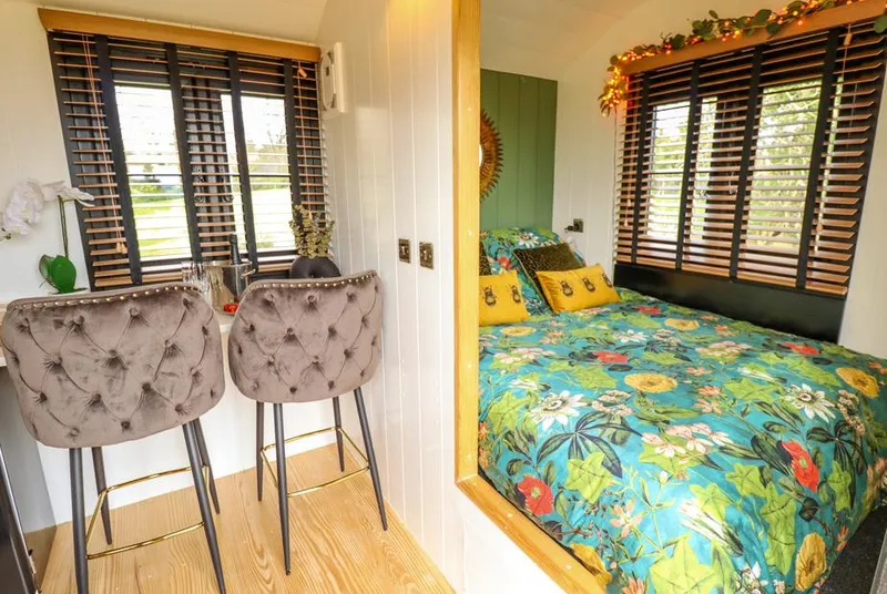 Limetree Luxury Glamping Portland floral bed nook with breakfast bar