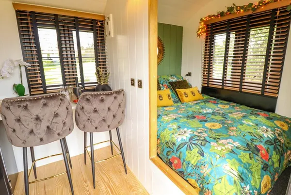 Limetree Luxury Glamping Portland floral bed nook with breakfast bar