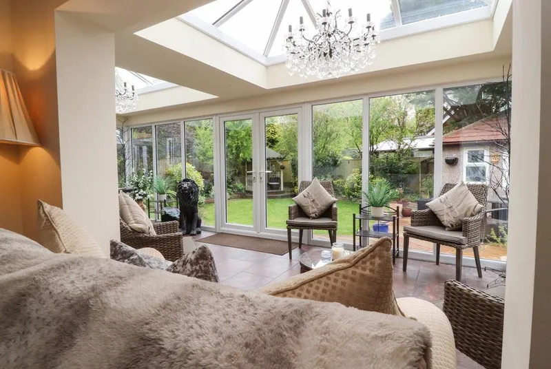 Linwood garden room with skylights and full-height windows