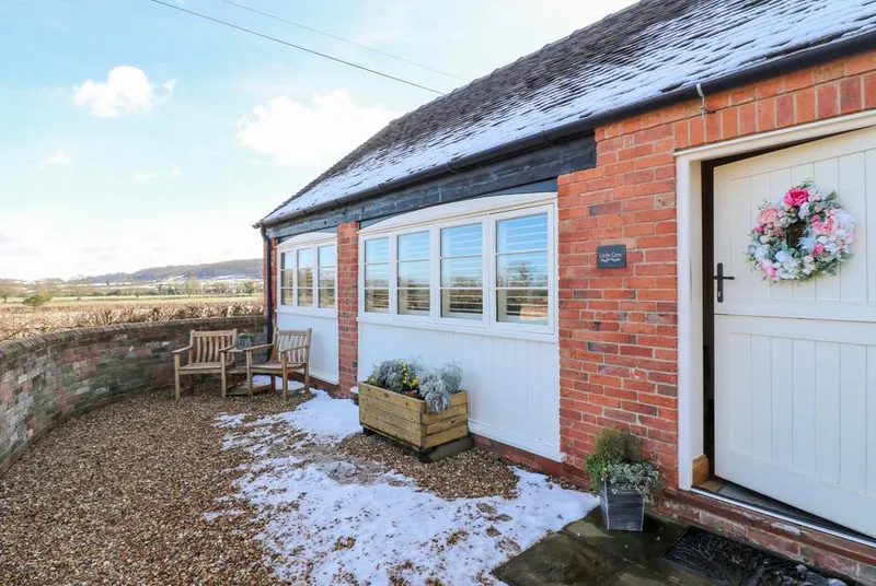 Little Gem side entrance with countryside views and courtyard