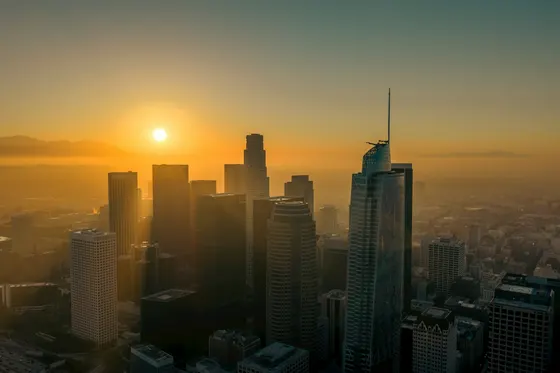 Downtown Los Angeles skyline glowing in the sunrise