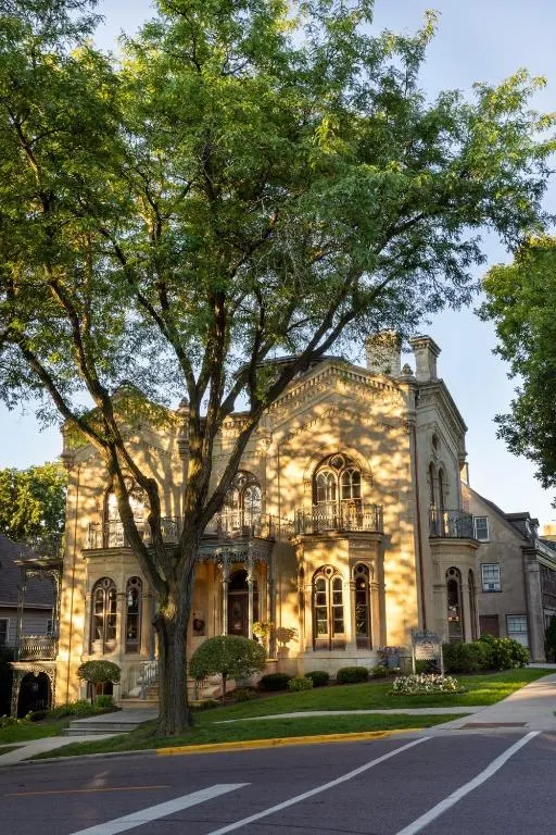 Large building with a tree in front of it