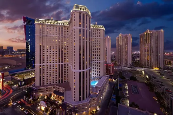 View of a large building in a city at night