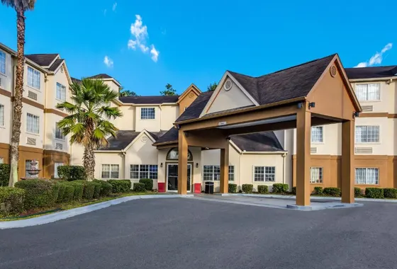Large apartment building with a parking lot
