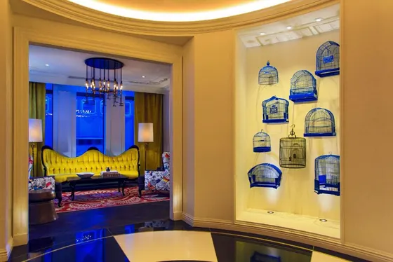 Lobby with a room with a couch and a window