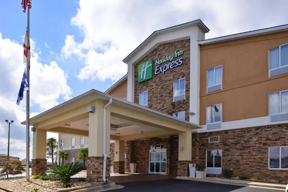 Hotel with a sign on the front of a building
