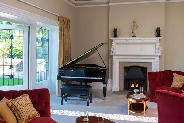 Moorlands Manor grand kitchen with a large fireplace