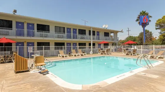 Large swimming pool in front of a hotel