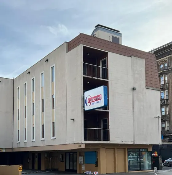 Building with a sign on the side of it
