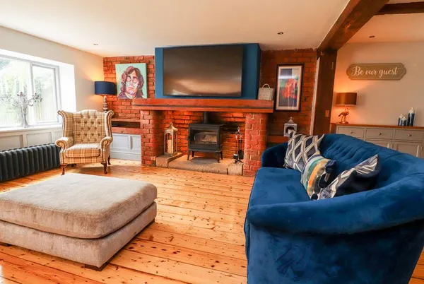 Noahs Barn lounge with sofas and a warm rustic finish