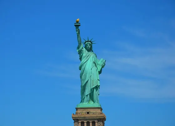 Statue of Liberty against a clear blue sky