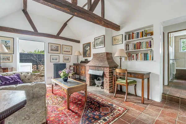 Old Rectory Cottage vaulted beamed living room with brick fireplace