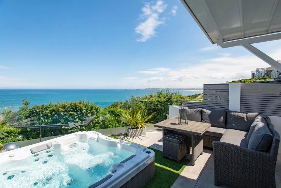 One Atlantic Watch hot tub terrace with sea view and outdoor sofa