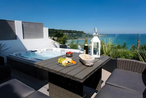 One Atlantic Watch terrace dining beside hot tub overlooking St Ives Bay