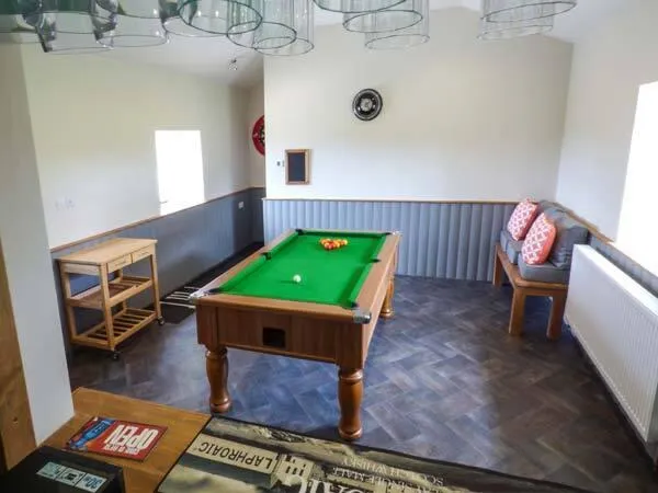 Ox Hey Barn games room with pool table and seating