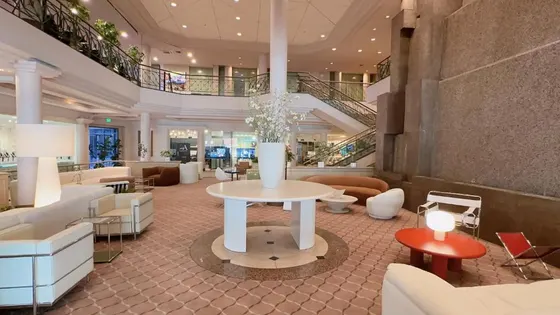 Lobby with a table and chairs in a building