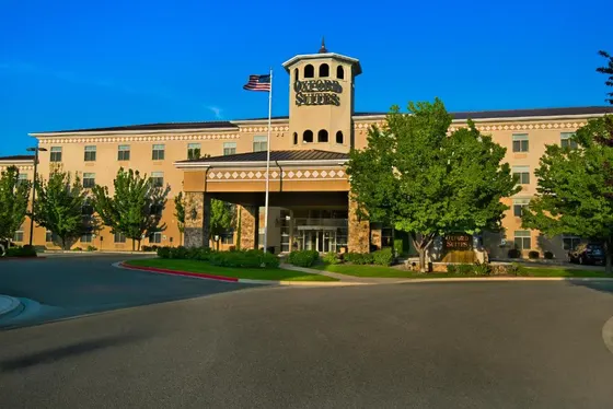 Building with a clock tower on top of it