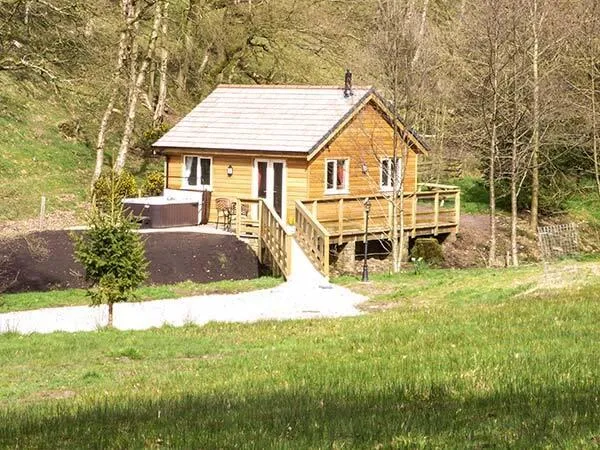 Park Brook Retreat timber cabin exterior in a rural setting