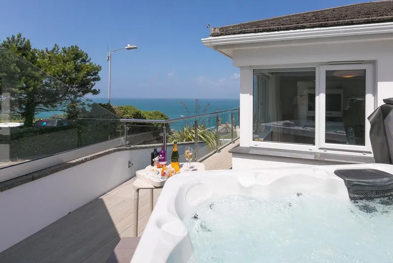 Portside hot tub terrace with sea view