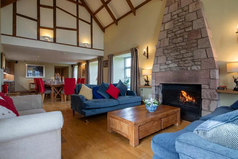 Quarryfield vaulted lounge with large fireplace