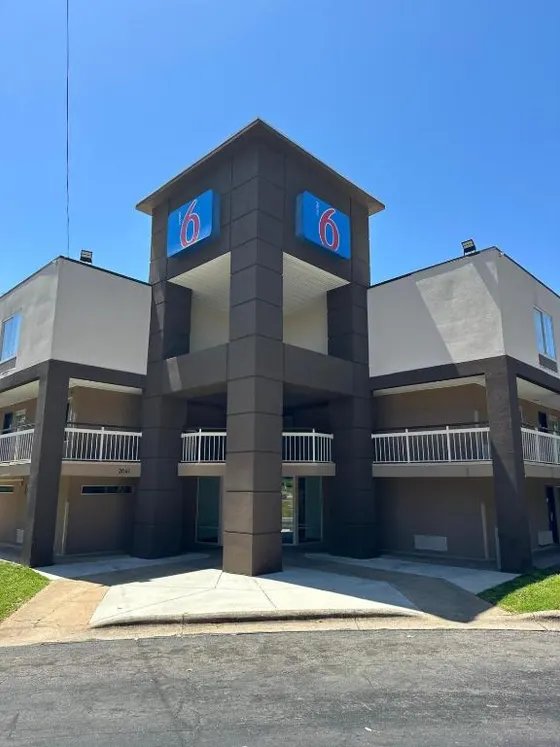 Building with a sign on the front of it