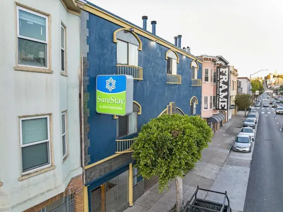 Sign on the side of a blue building