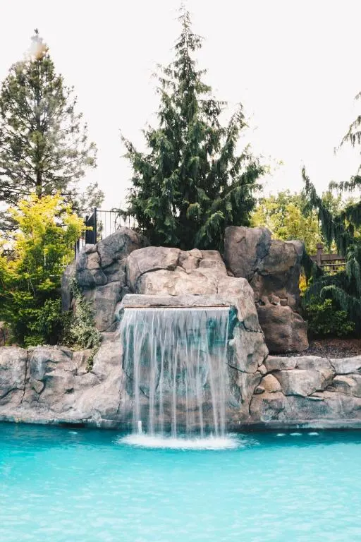 Waterfall in a pool with blue water