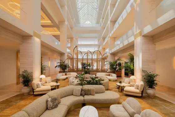 Large lobby with couches and chairs in a building