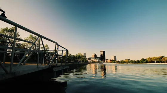Rochester skyline reflected in the river at sunset