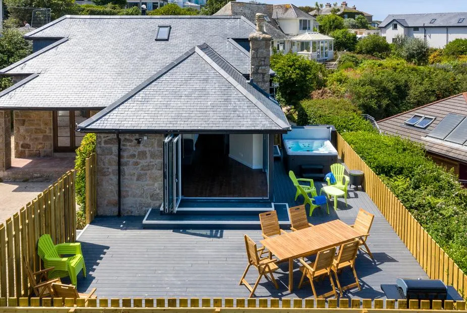 Rocky Close aerial exterior with deck and hot tub