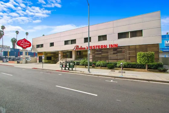Building on the side of a street with a stop sign