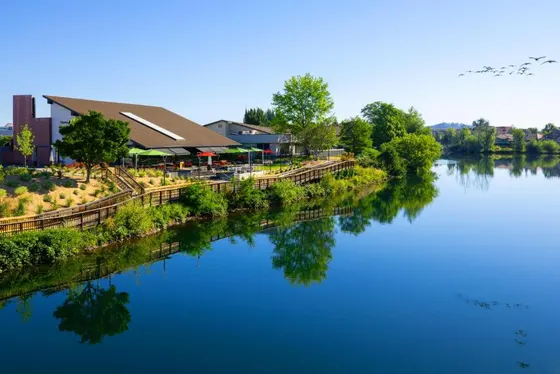 View of a river with a restaurant next to it