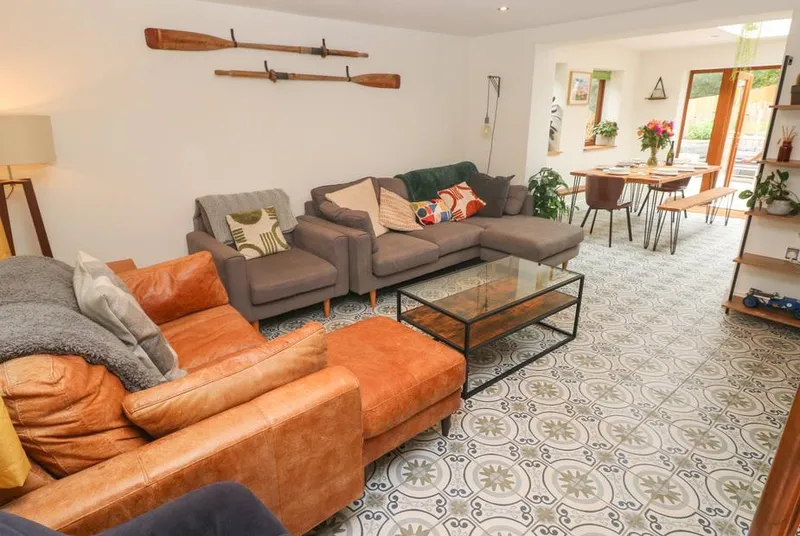 Rudbaxton Water lounge with patterned floor and deep seating