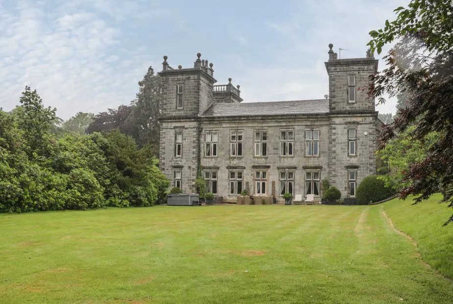 Scale House grand stone manor from lawn