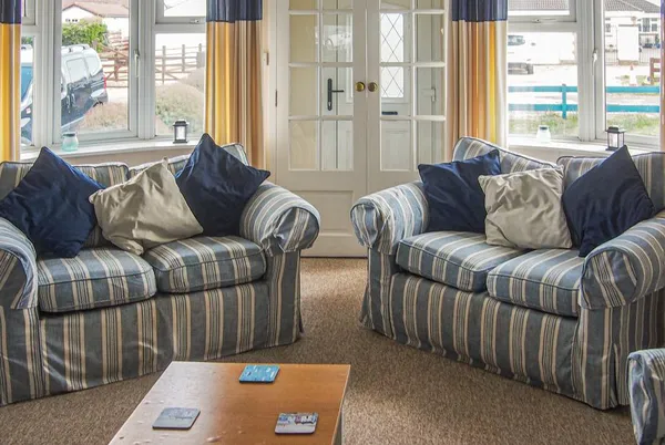 Seagull Cottage living room with striped coastal sofas
