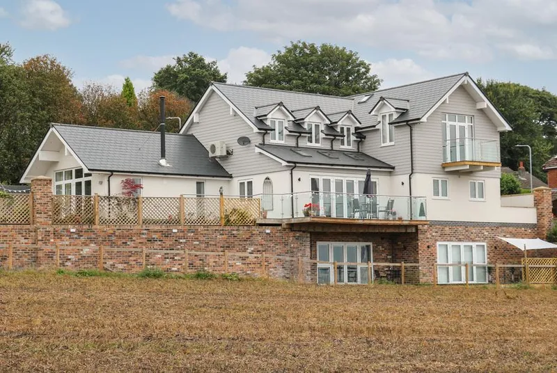 Slitting Mill Annex rear elevation with balcony and rural field