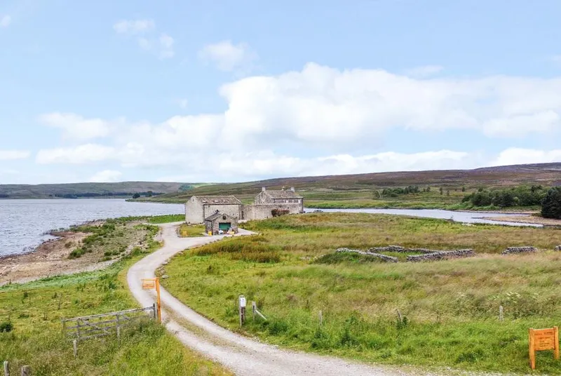 Snave Barn stone conversion at Grimwith Reservoir with moorland