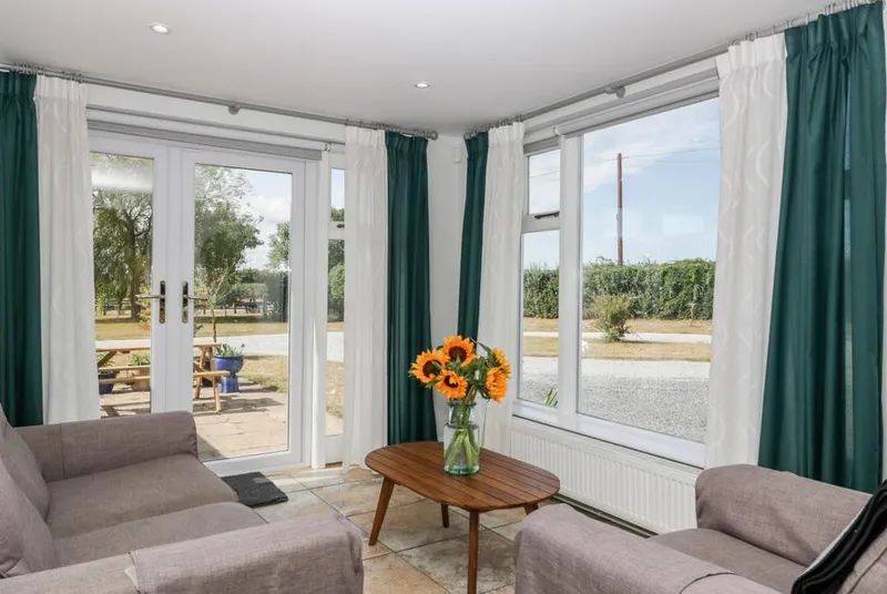 Somerset House conservatory with French doors opening to garden