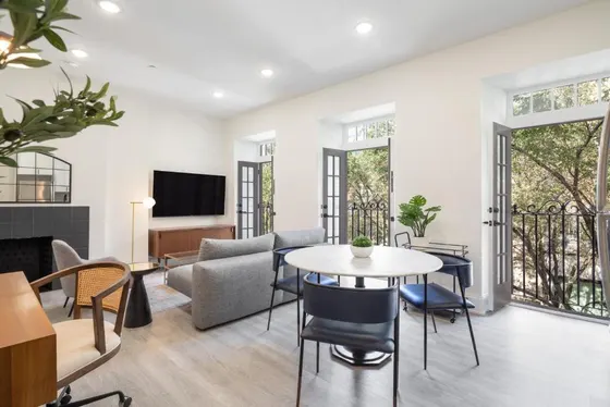 Living room with a table and chairs