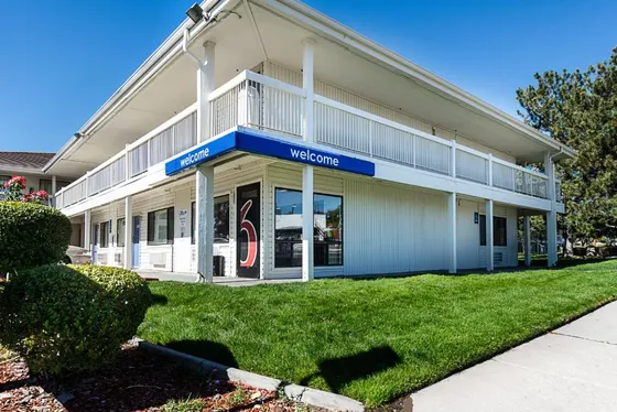 Building with a welcome sign on the side of it