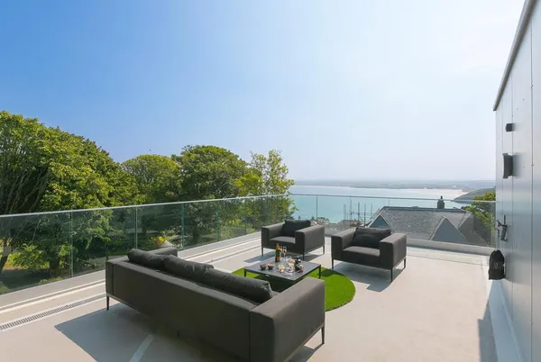 Sparrows Nest roof terrace seating with sea glimpse